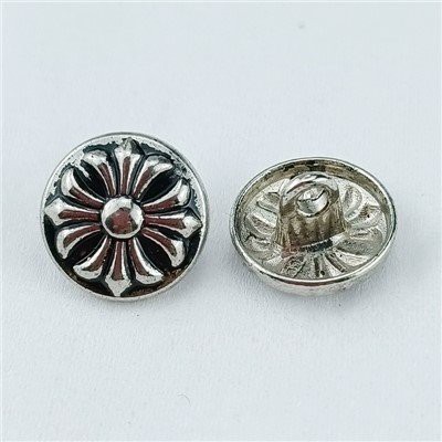 Botons metàl·lics gravats amb strass